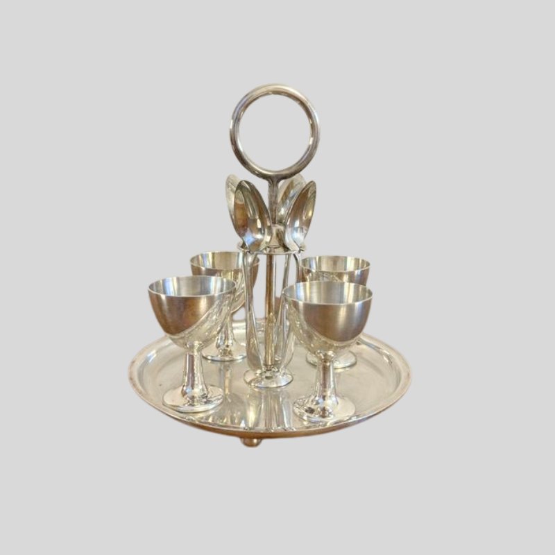 A silver egg cruet set, a lovely Easter antique